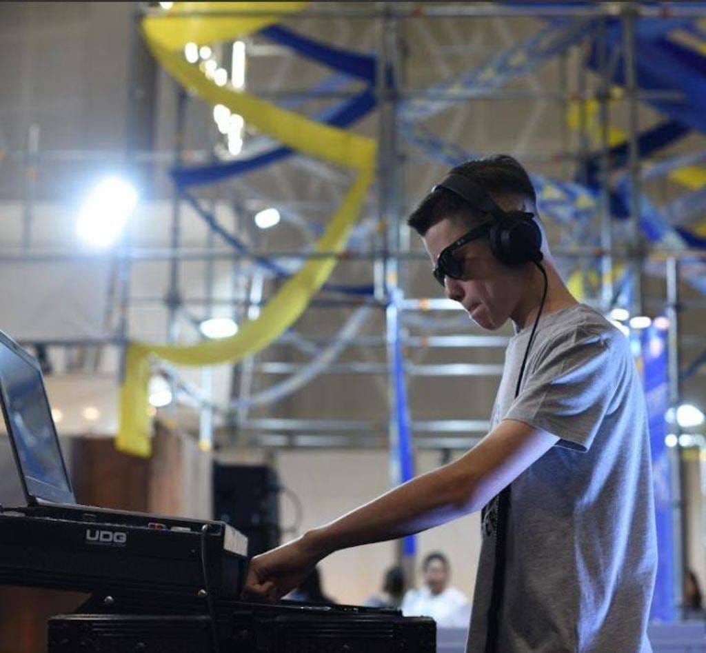 DJ Webley performing at the decks